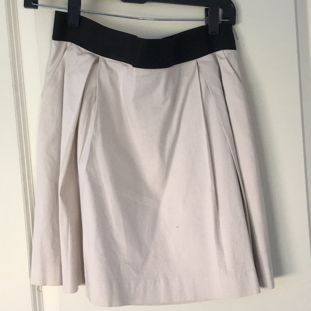 A-line cream skirt with black band